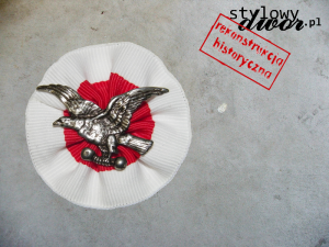 Kokarda Polskiego Towarzystwa Gimnastycznego „Sokół”.